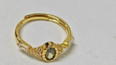 Gold Dark Oval Gemstone Ring | Clear Side Stones | Mystery & Elegance