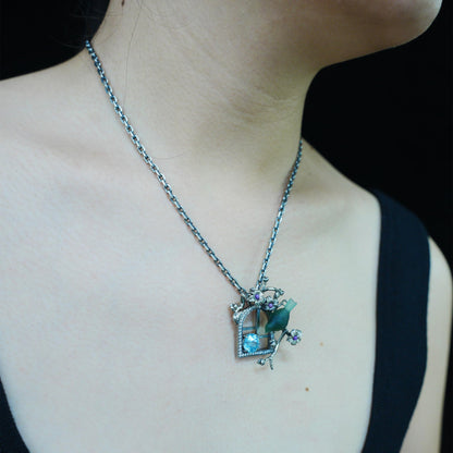 Green Bird Pendant Necklace at Window | Hand-Carved Silver Floral Bird Jewelry | Whimsical Springtime Gift for Nature Lovers and Dreamers