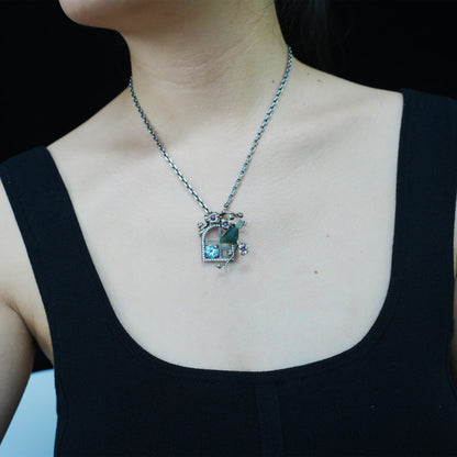 Green Bird Pendant Necklace at Window | Hand-Carved Silver Floral Bird Jewelry | Whimsical Springtime Gift for Nature Lovers and Dreamers