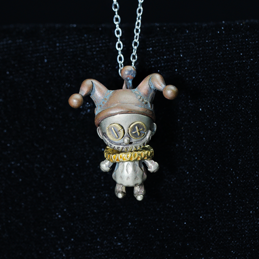 Broken Smile Jester Pendant Necklace – Gothic Copper Doll Clown Charm with Dark Fantasy Style