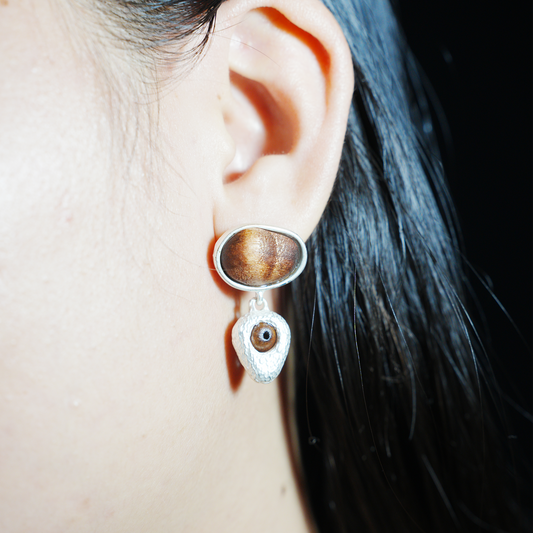 Eye of the Seed – Abstract Cat Eye Earrings with Wood-Style Gem & Textured Frame