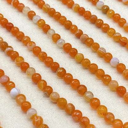 Facettierte orange Achatperlen für DIY Schmuckherstellung, runde geschnittene Edelsteine, banded Muster, ca. 6mm, Strang ca. 38cm