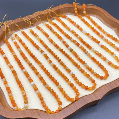 Facettierte orange Achatperlen für DIY Schmuckherstellung, runde geschnittene Edelsteine, banded Muster, ca. 6mm, Strang ca. 38cm