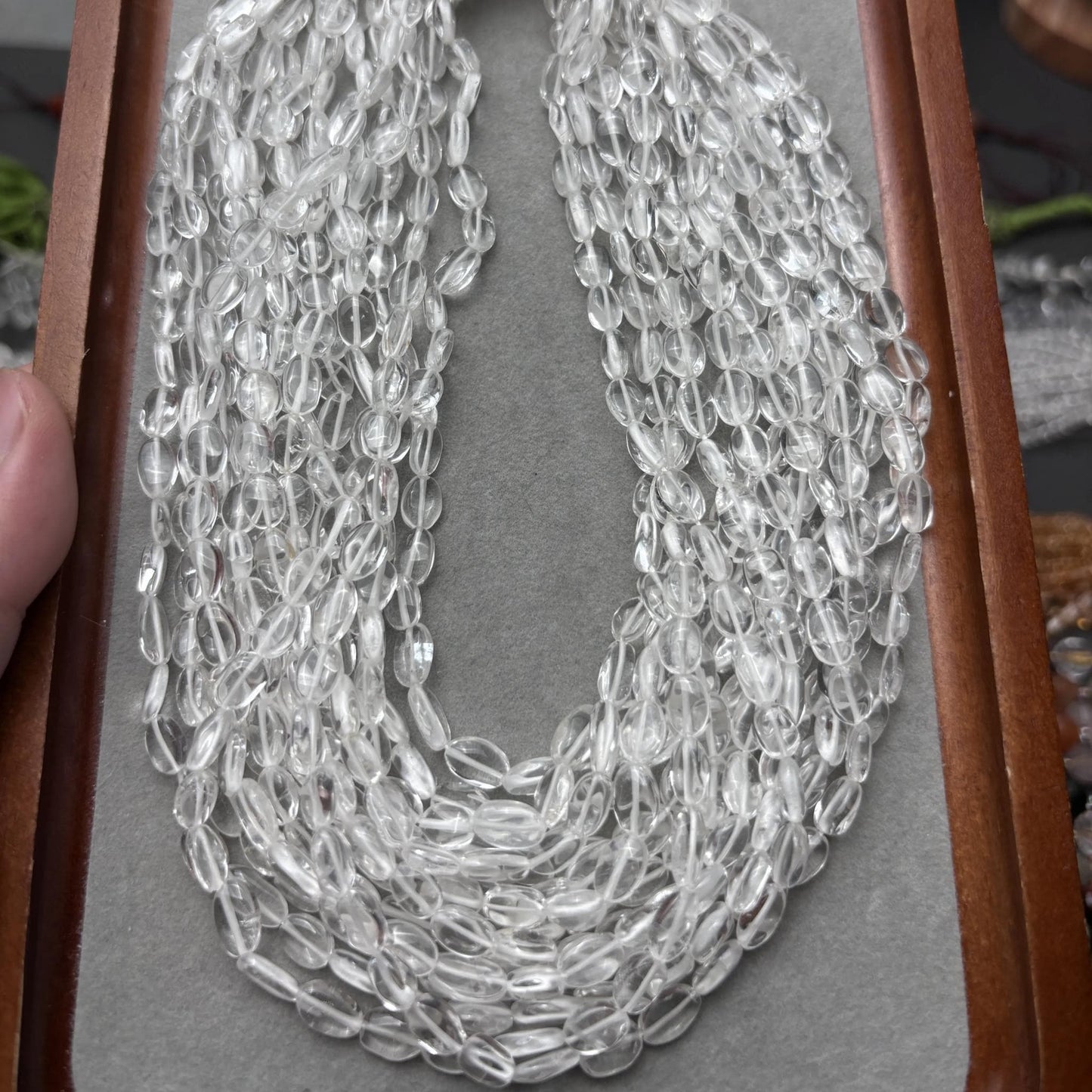 Natürliche klare Quarz Ovalperlen für Schmuckherstellung, polierte Eiform Edelsteine aus Indien, Edelsteinstrang ca. 38cm