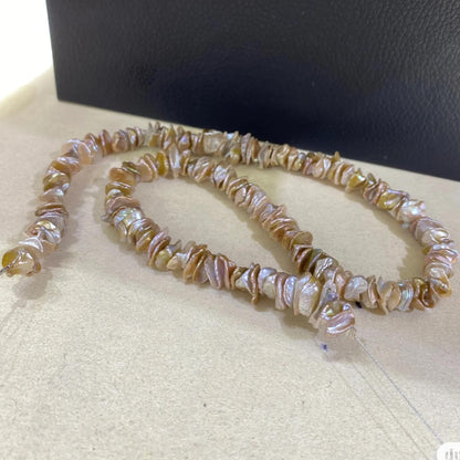 Handgefertigter Strang aus natürlichen unregelmäßigen blassrosa Barock Süßwasserperlen für DIY Schmuck Halsketten Armbänder Ohrringe