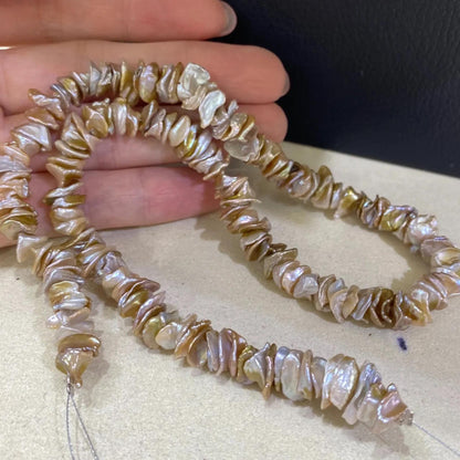 Handgefertigter Strang aus natürlichen unregelmäßigen blassrosa Barock Süßwasserperlen für DIY Schmuck Halsketten Armbänder Ohrringe