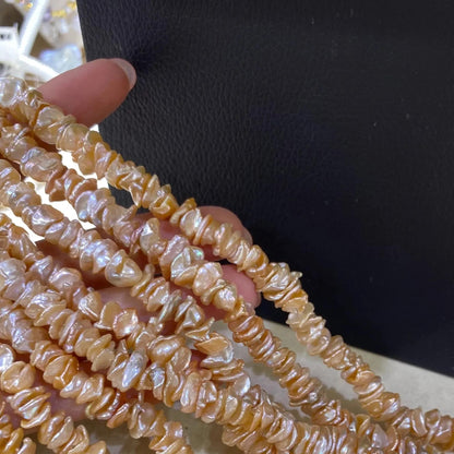 Natürliche Barockperlen in Orangeton – Blütenförmige Süßwasser-Keshi-Perlen für DIY-Schmuck & Boho-Design, ca. 38cm Strang