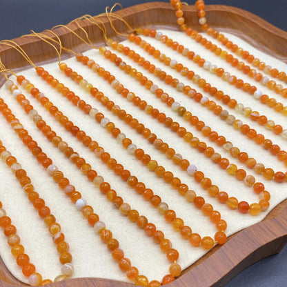 Facettierte orange Achatperlen für DIY Schmuckherstellung, runde geschnittene Edelsteine, banded Muster, ca. 6mm, Strang ca. 38cm