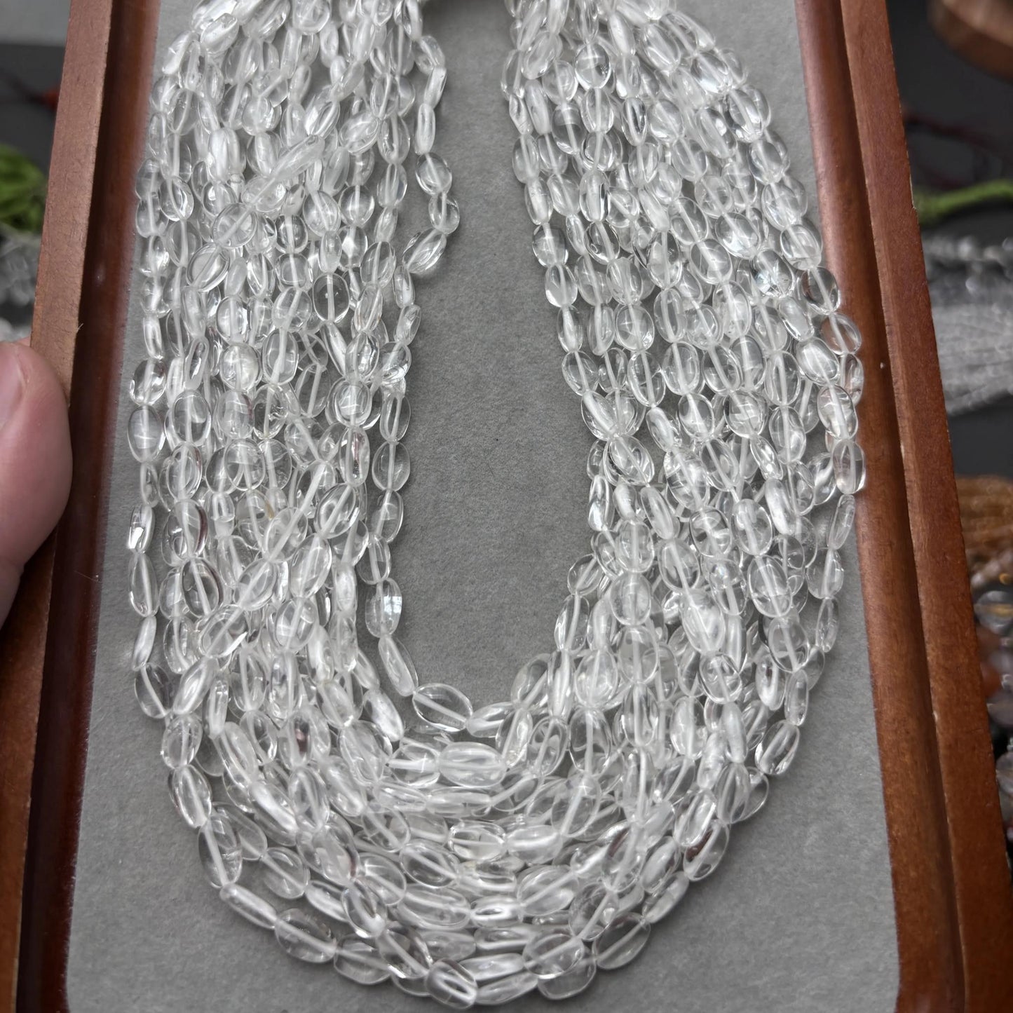 Natürliche klare Quarz Ovalperlen für Schmuckherstellung, polierte Eiform Edelsteine aus Indien, Edelsteinstrang ca. 38cm