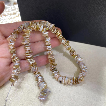 Handgefertigter Strang aus natürlichen unregelmäßigen blassrosa Barock Süßwasserperlen für DIY Schmuck Halsketten Armbänder Ohrringe