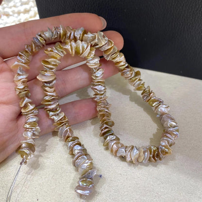 Handgefertigter Strang aus natürlichen unregelmäßigen blassrosa Barock Süßwasserperlen für DIY Schmuck Halsketten Armbänder Ohrringe