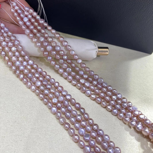 Zartrosa Süßwasserperlenstrang für Schmuckherstellung DIY, handverlesene ovale Perlen mit Glanz, romantischer Perlenschmuck 38cm