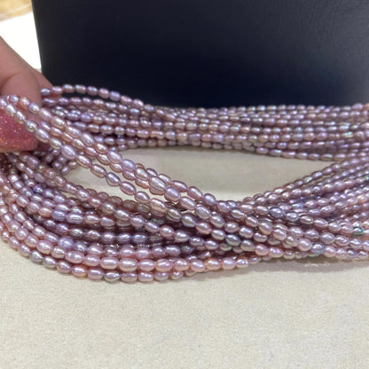 Natürliche Süßwasserperlen in Lavendelfarbe für DIY Schmuck, Kleine Reisform Perlen Strang, Oval Beads für Armbänder und Halsketten